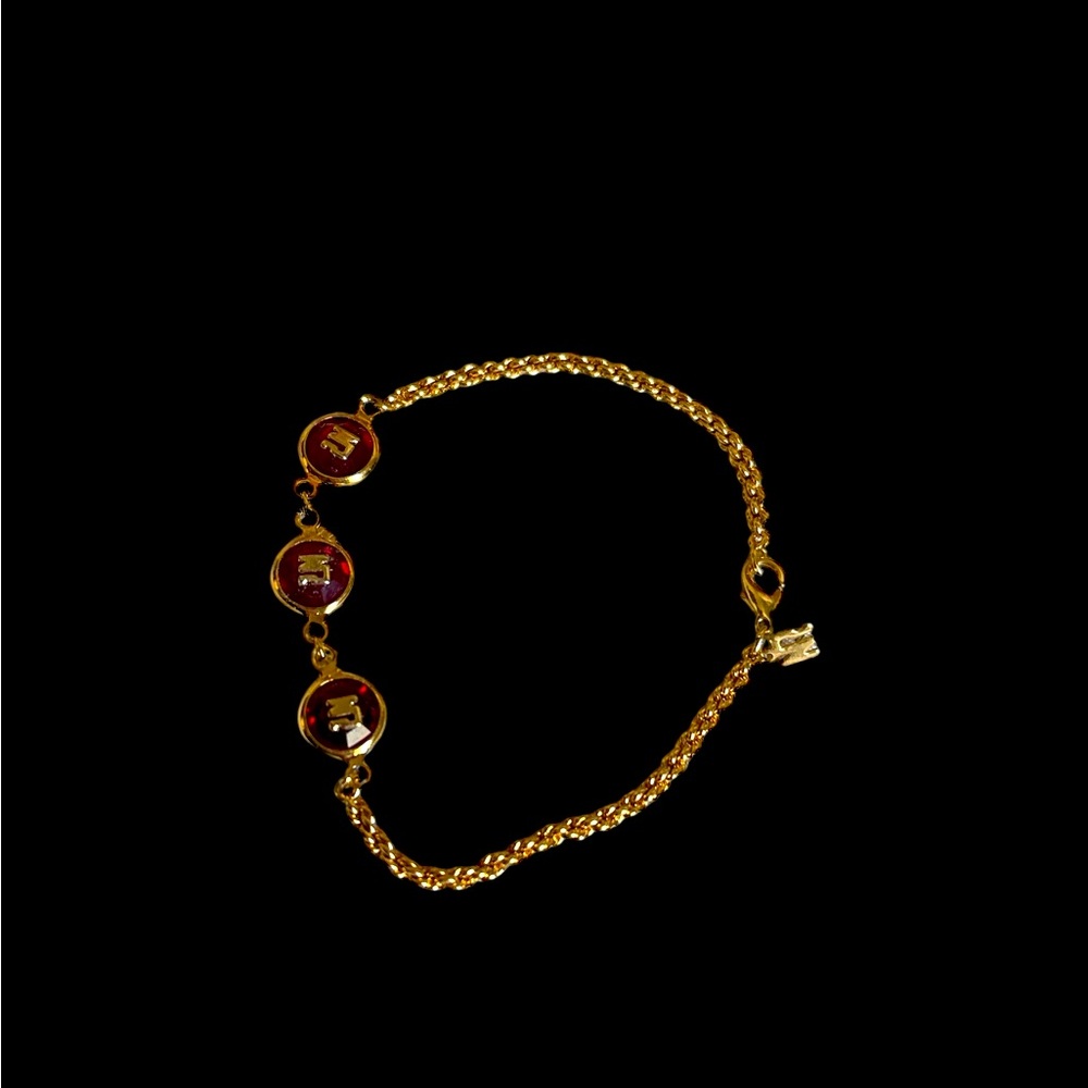Nina Ricci golden and red chain bracelet